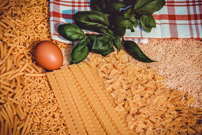Dried pasta shapes including small grain-shaped orzo