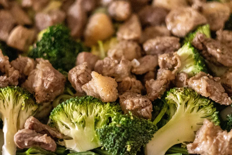 Chunks of braised beef with broccoli florets