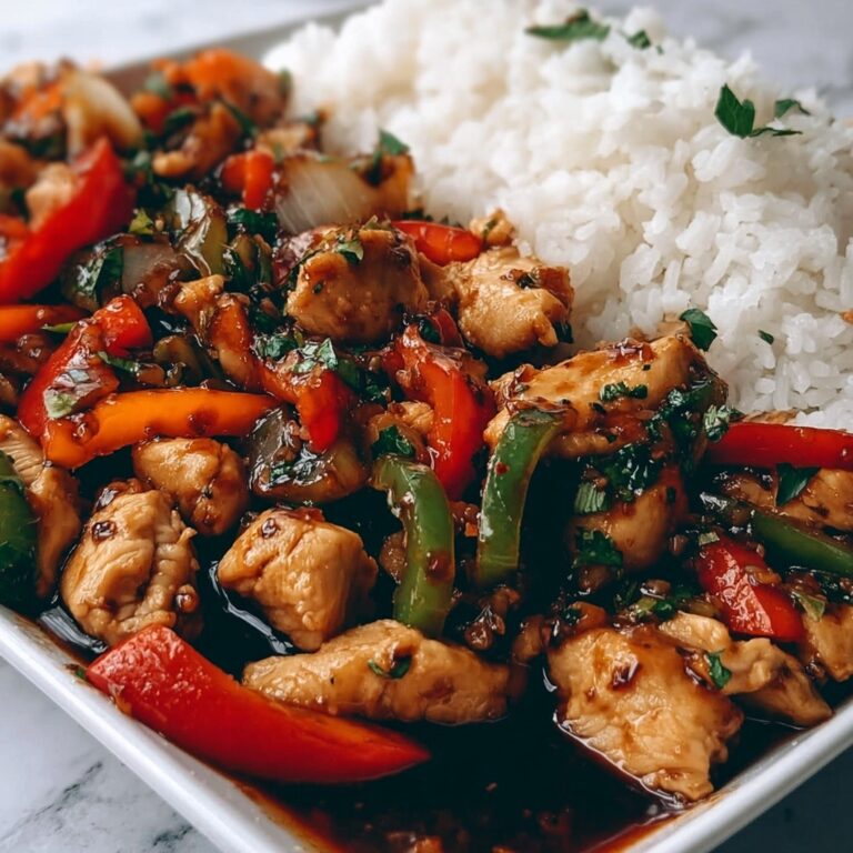 Sizzling Garlic Chicken Stir-Fry with Peppers & Steamed Rice Recipe